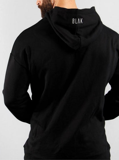 Black hoodie with 'BLAK' branding on the back against a gray background