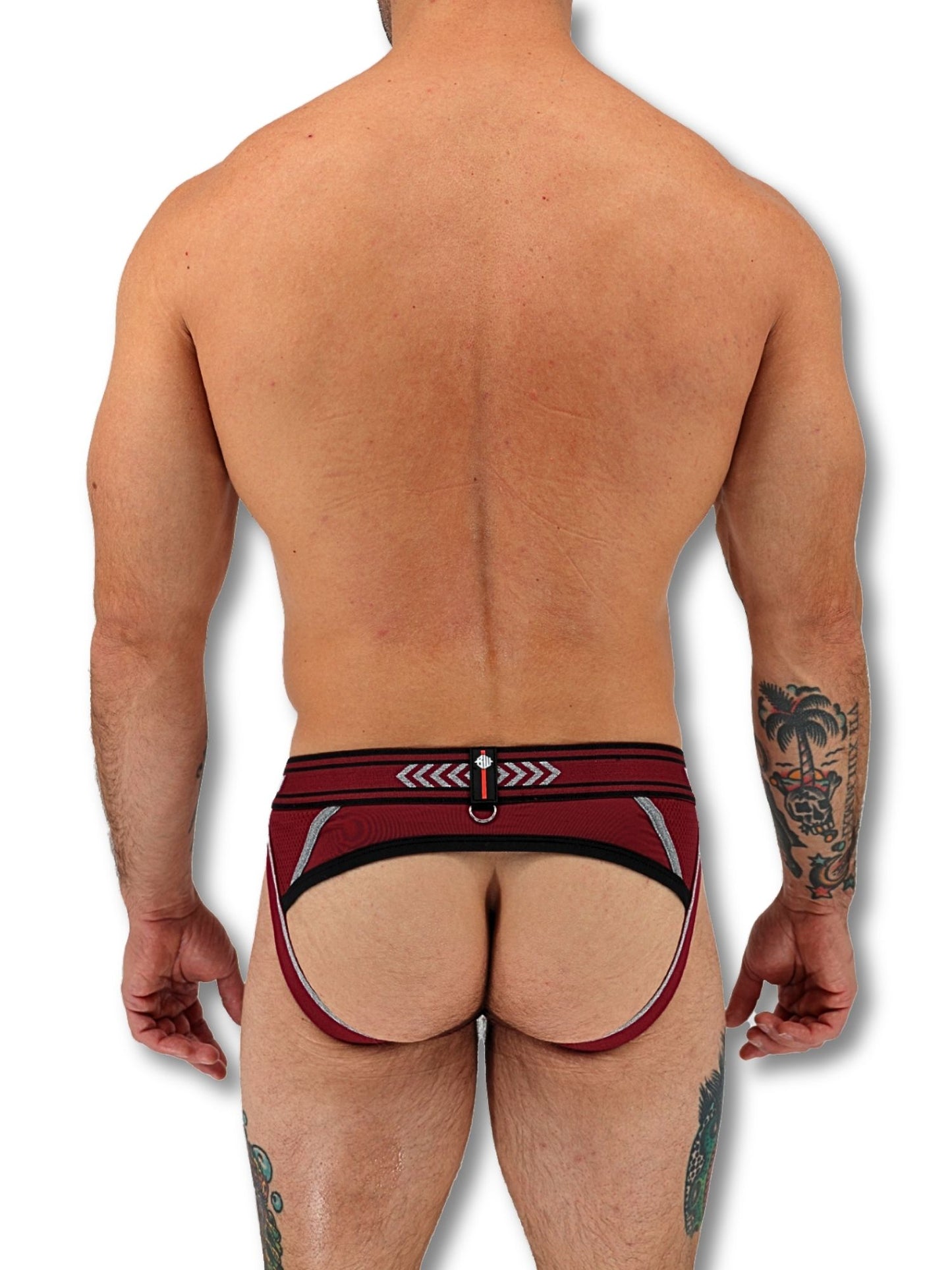 Man wearing a red and black men's underwear on a white background