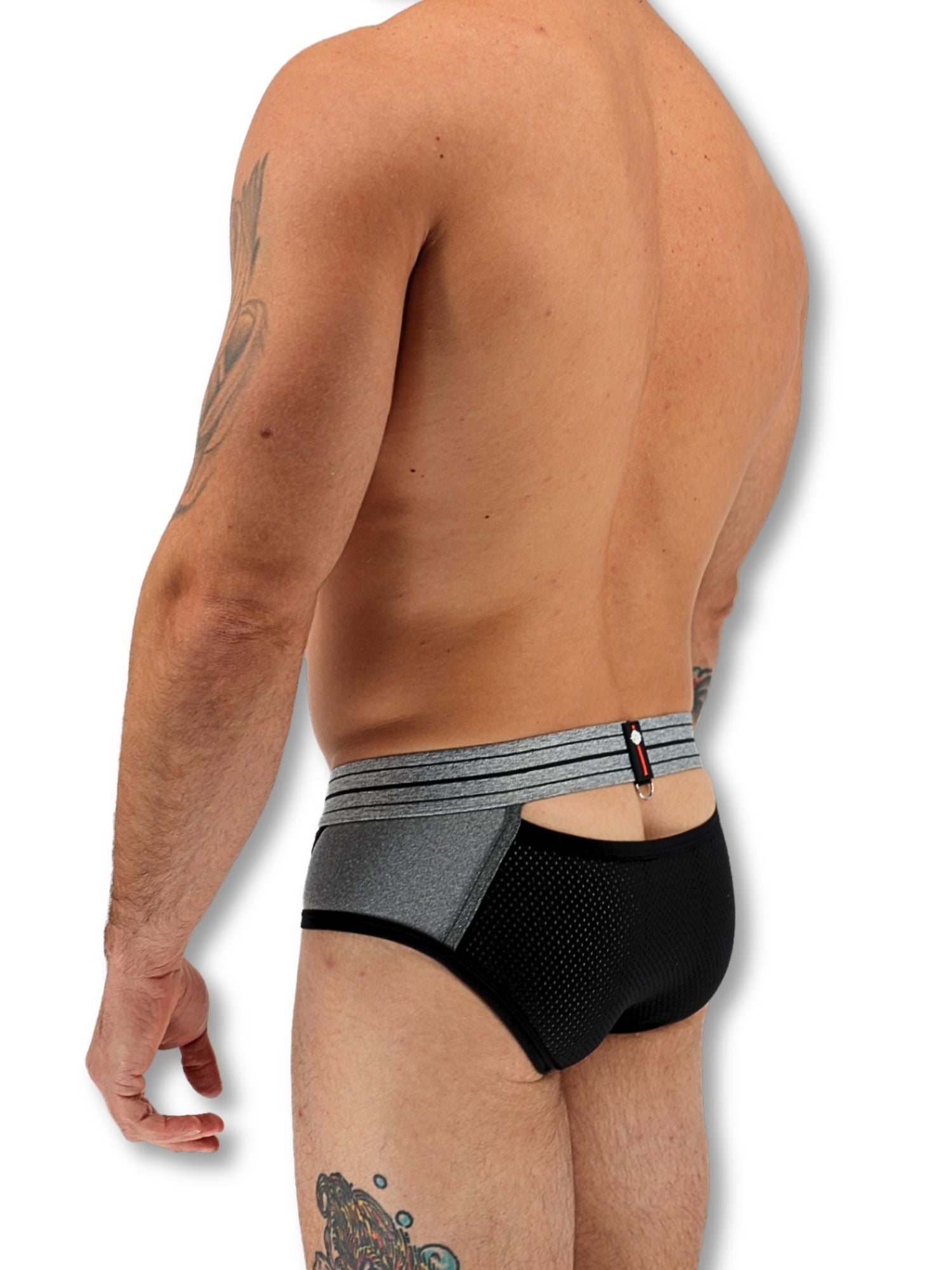Man wearing black and gray underwear on a white background