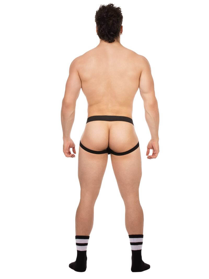 Man wearing a black men's jockstrap on a white background