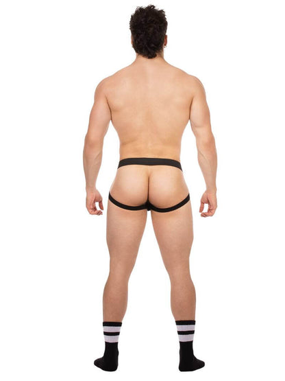 Man wearing a black men's jockstrap on a white background