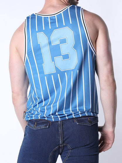 A man wearing a light blue pinstriped basketball jersey with the number 13 on the back, paired with dark blue jeans, shown from a rear three-quarter view against a white studio background.