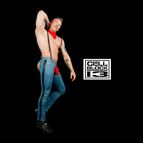 Gay Man in blue chaps denim jeans and red bandana posing against a black background with 'Cell Block 13' logo.