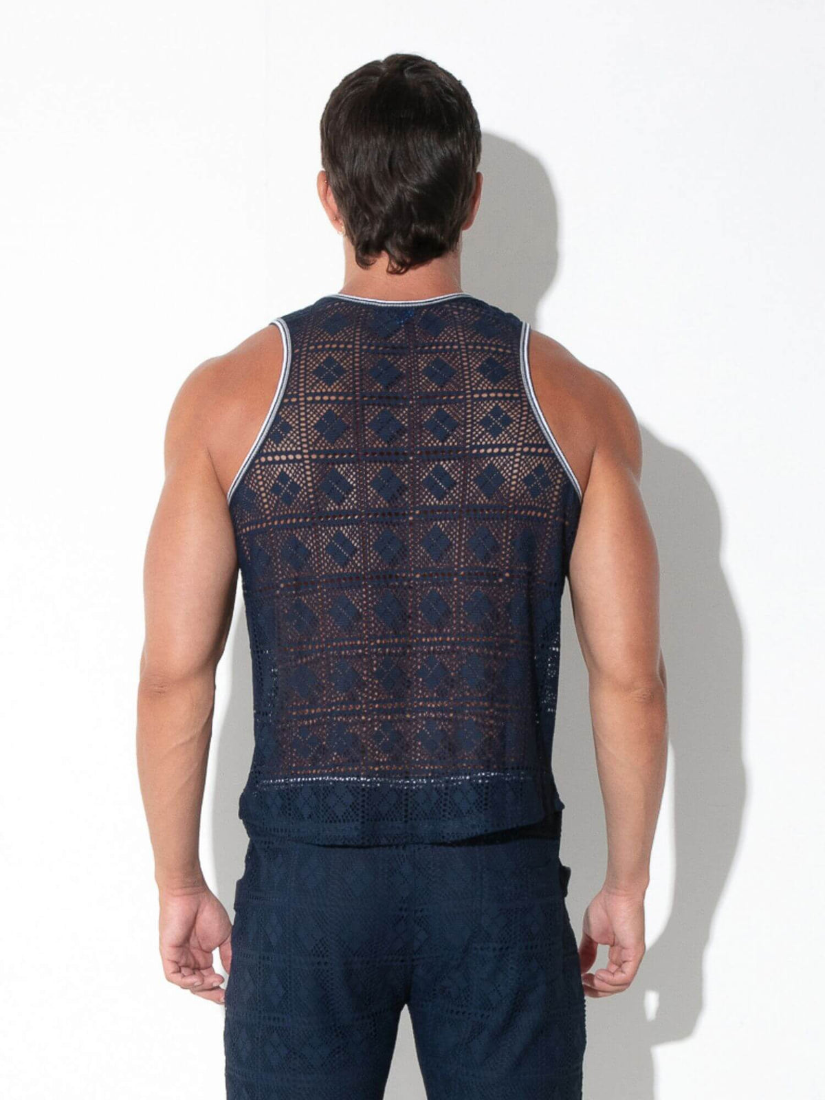 Rear view of CODE 22 Graphic Lace Tank Top in navy