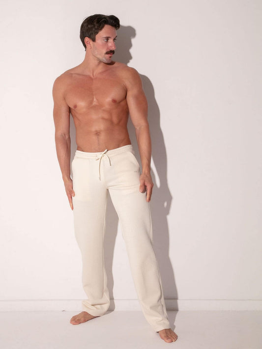 man wearing off-white code 22 medley tank top and pants