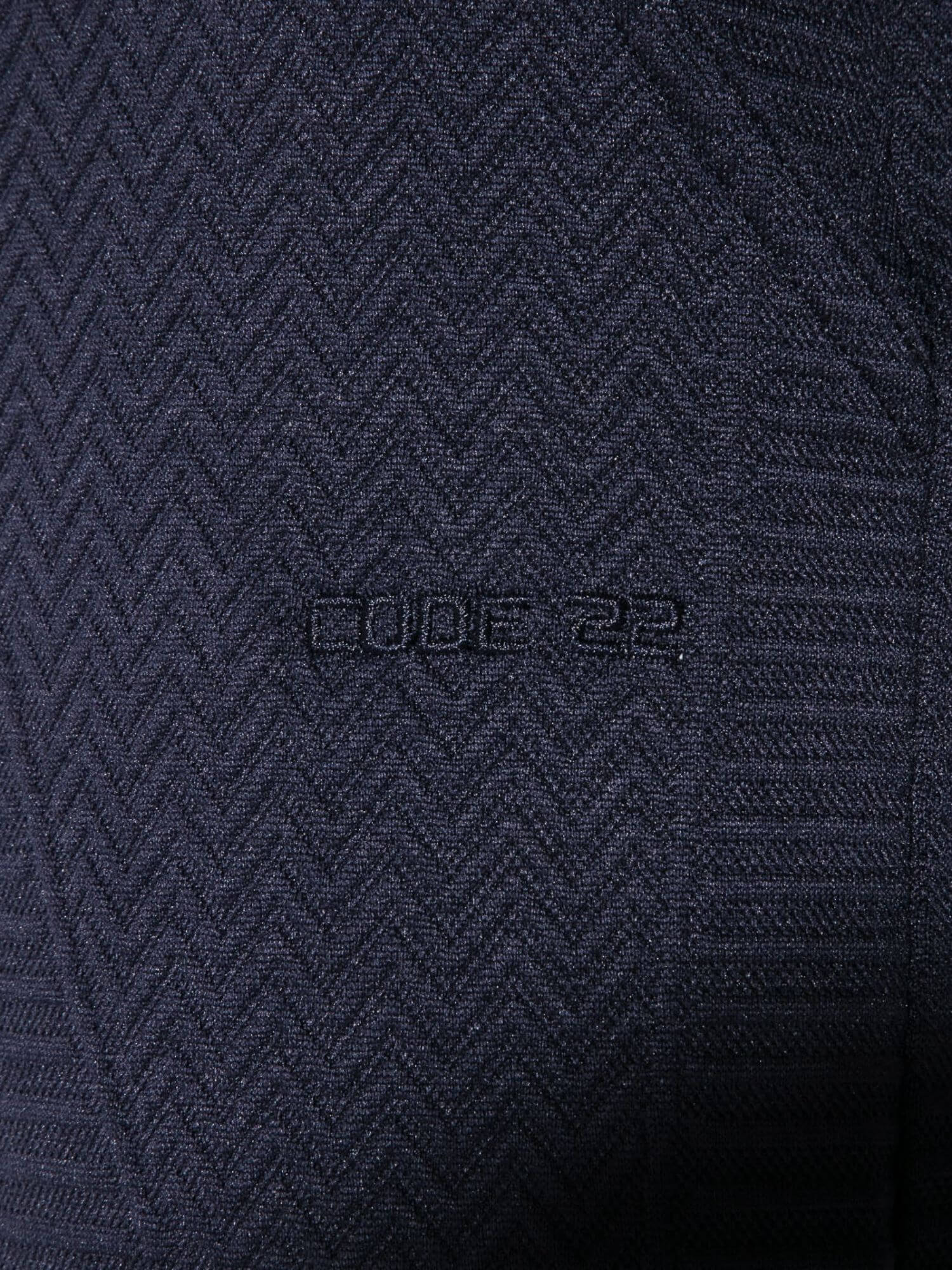 Navy blue textured fabric with 'CODE 22' branding.