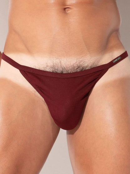 Close-up detail of CODE 22 Pure Thong men's underwear in maroon