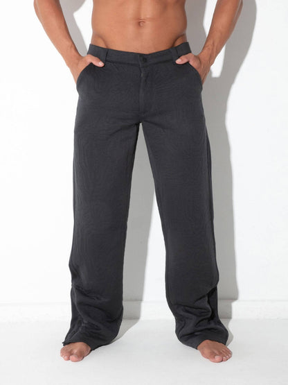 Front view of CODE 22 Quilted Snap-Detail Pants in charcoal