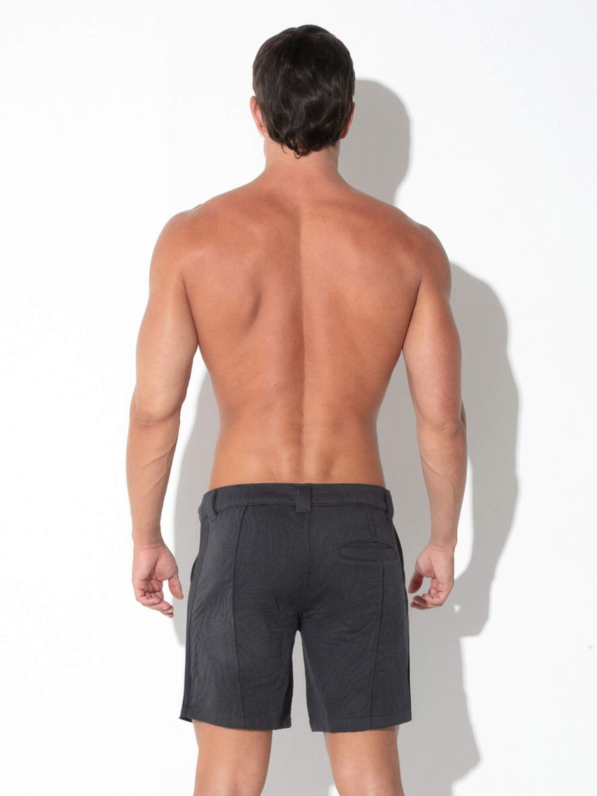 Rear view of CODE 22 Quilted Snap-Detail Shorts in charcoal