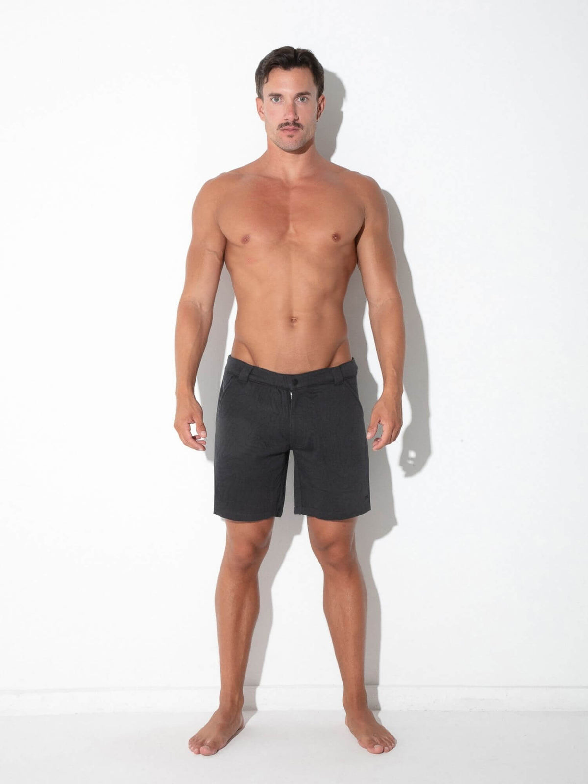 Full view of CODE 22 Quilted Snap-Detail Shorts in charcoal