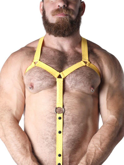 Man wearing a yellow harness on a white background