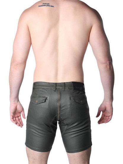 Man wearing dark green shorts on a white background