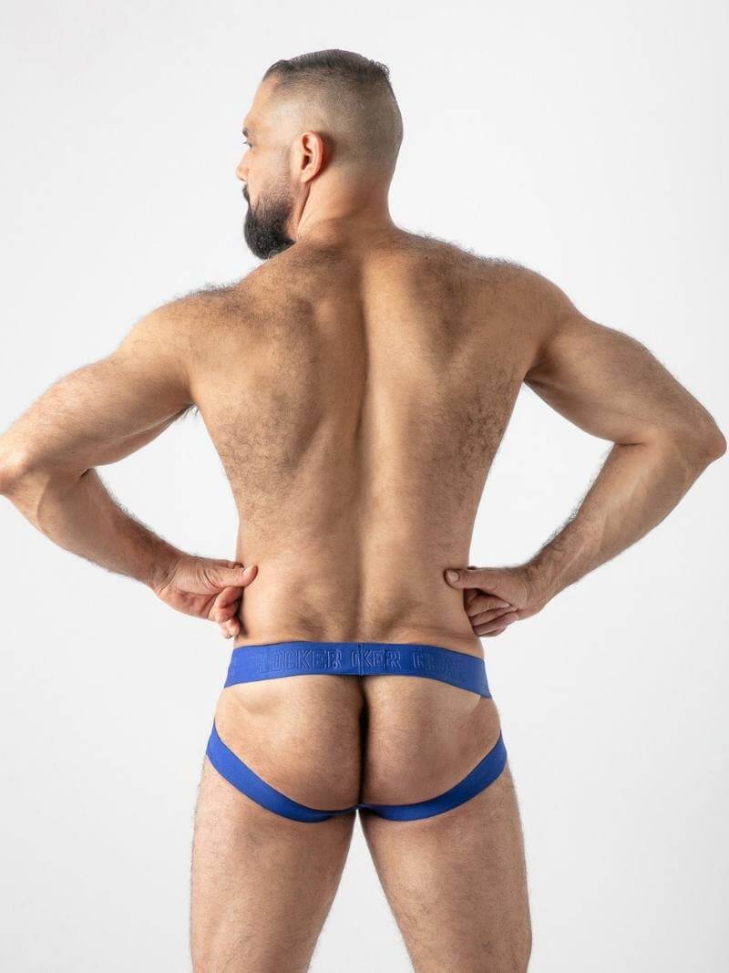 Man wearing blue underwear on a white background