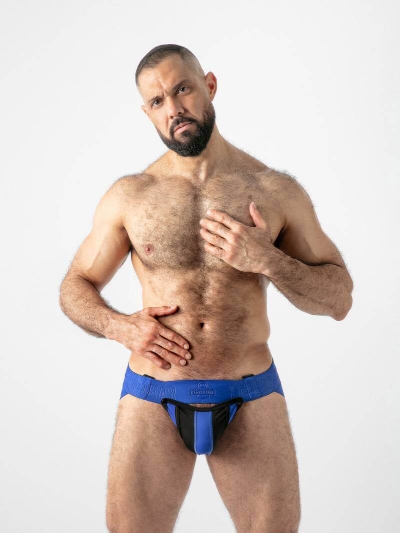 Man wearing blue underwear on a white background