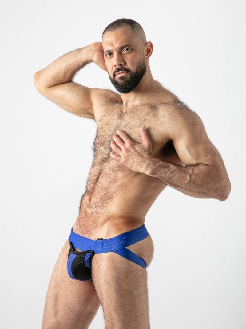 Man wearing blue underwear with a white background