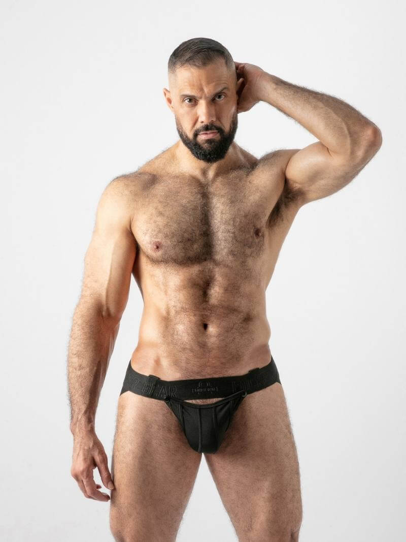 Man wearing a black men's underwear on a white background