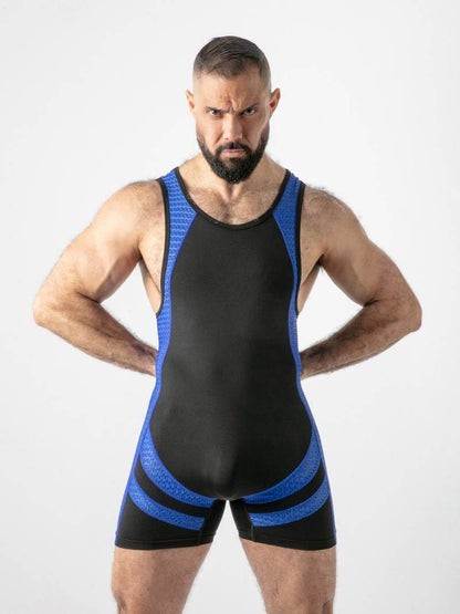 Man wearing a black and blue wrestling singlet on a white background