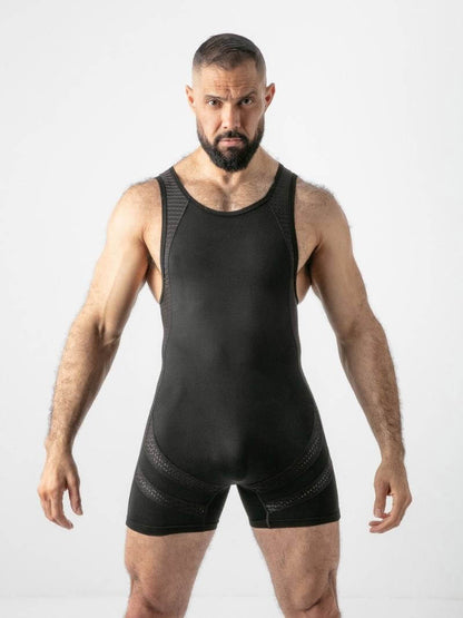 Man wearing a black singlet garment on a white background