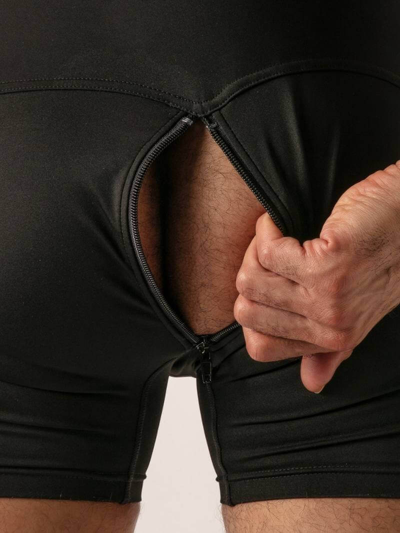 Person wearing black singlet with a close up of rear zipper detail