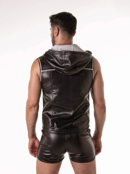 Man wearing a black leather vest and shorts on a white background