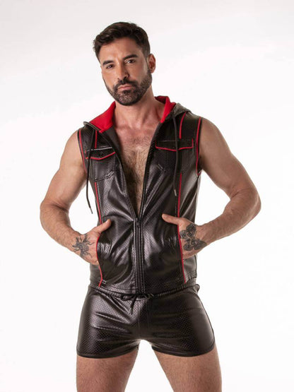 Man wearing a black leather vest with red trim on a white background