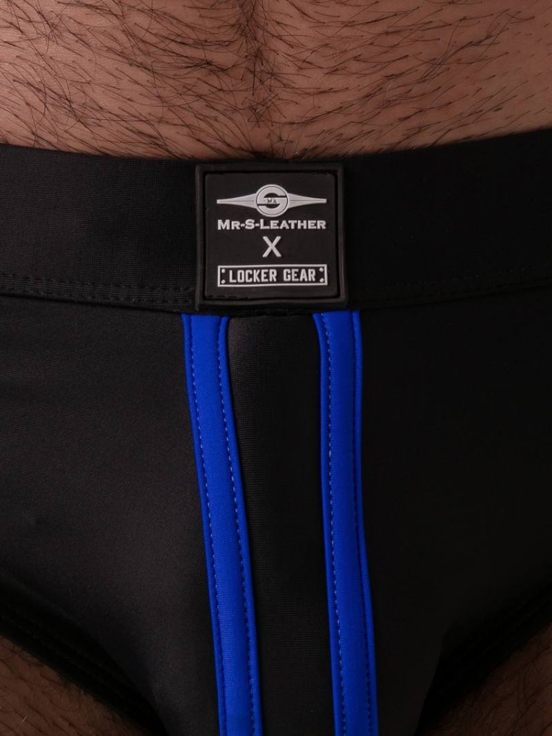 Black leather belt with blue strap and 'Mr. S Leather' label on a wooden surface