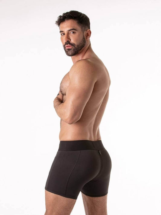 Man wearing black underwear on a white background