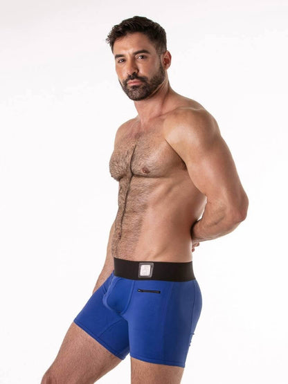 Man wearing blue underwear with a white background