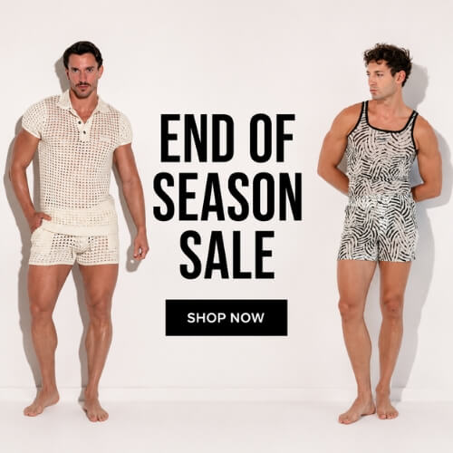 Two male models standing against a white wall wearing matching crochet and zebra-print one-piece sets, with large text reading 'END OF SEASON SALE' and a 'SHOP NOW' button.