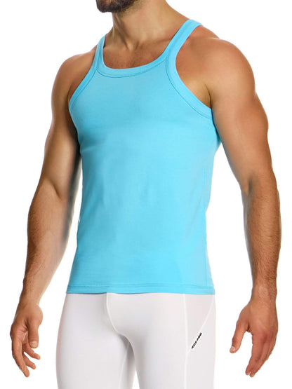 Person wearing a light blue tank top and white pants on a white background