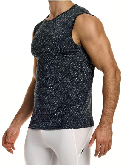 Person wearing a dark patterned sleeveless shirt and white pants on a white background