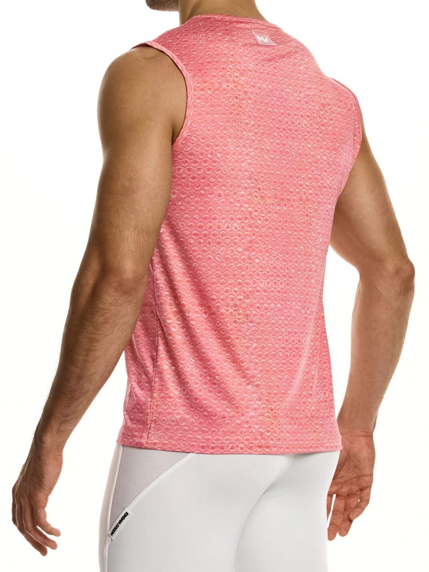 Person wearing a pink sleeveless athletic shirt on a white background