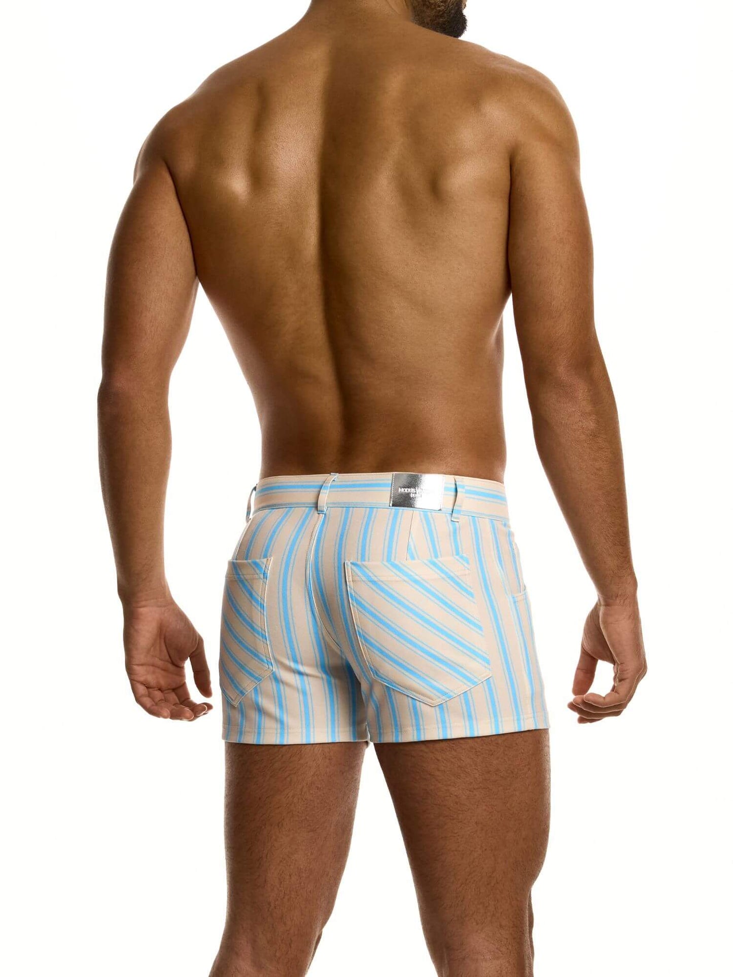 Man wearing beige and light blue striped shorts on a white background