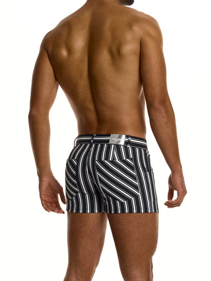 Man wearing black and white striped  shorts on a white background