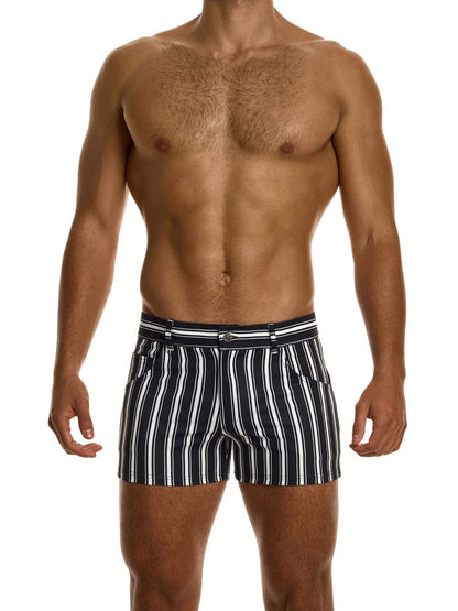 Man wearing black and white striped shorts on a white background