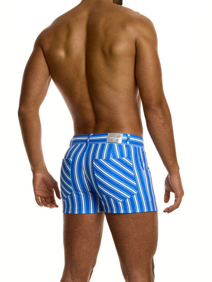 Man wearing blue and white striped shorts on a white background