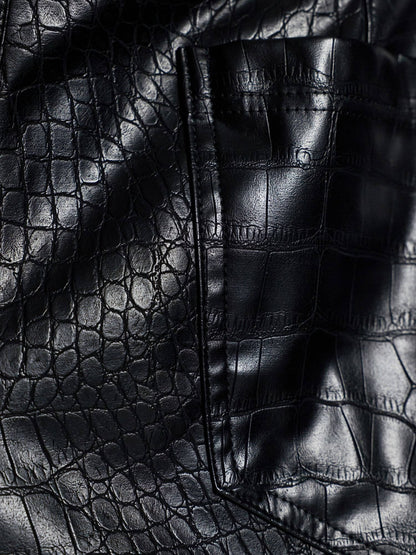 Close-up of black crocodile-textured fabric from the Modus Vivendi Croco collection