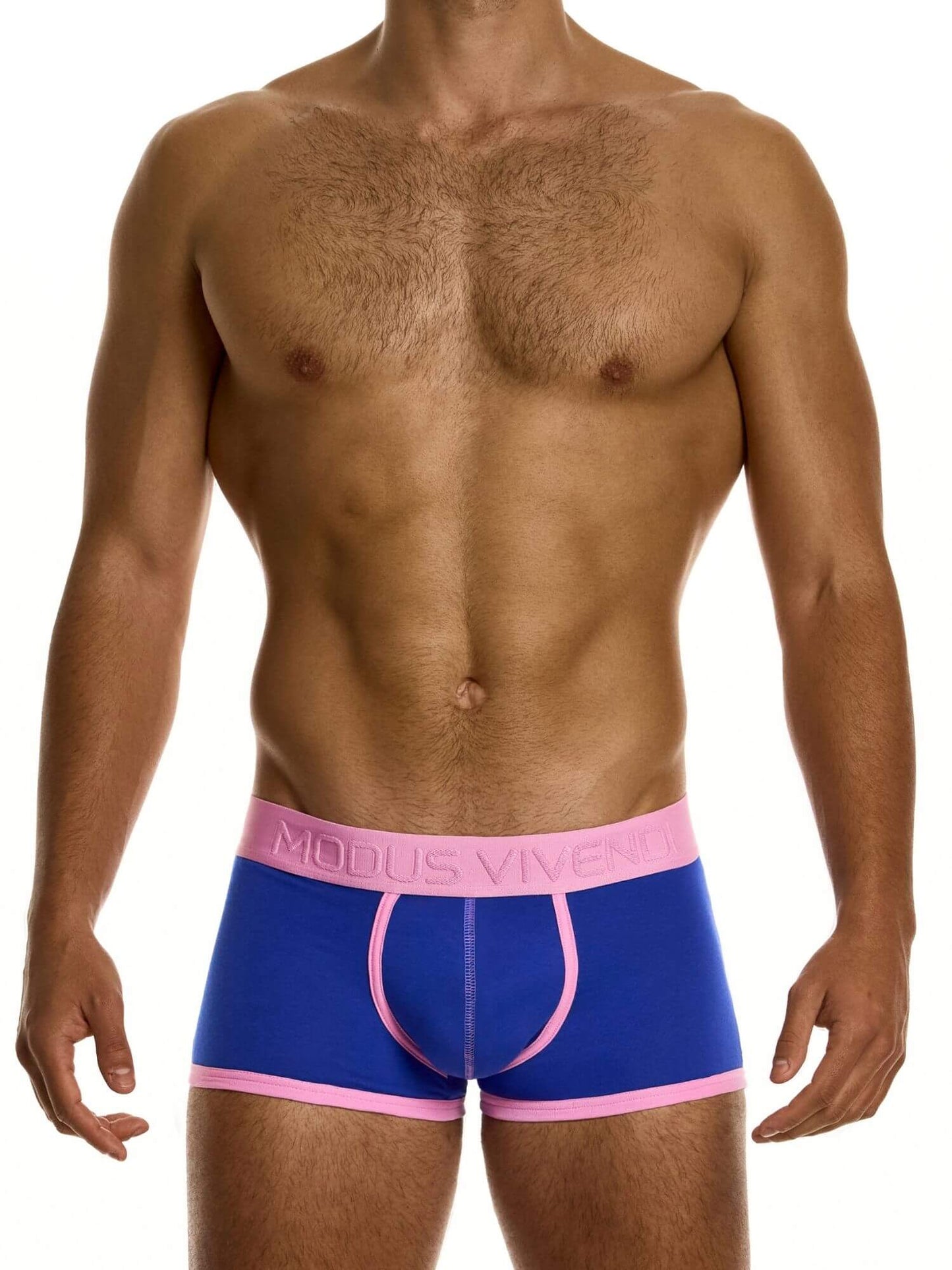 Man wearing blue underwear with pink waistband on a white background