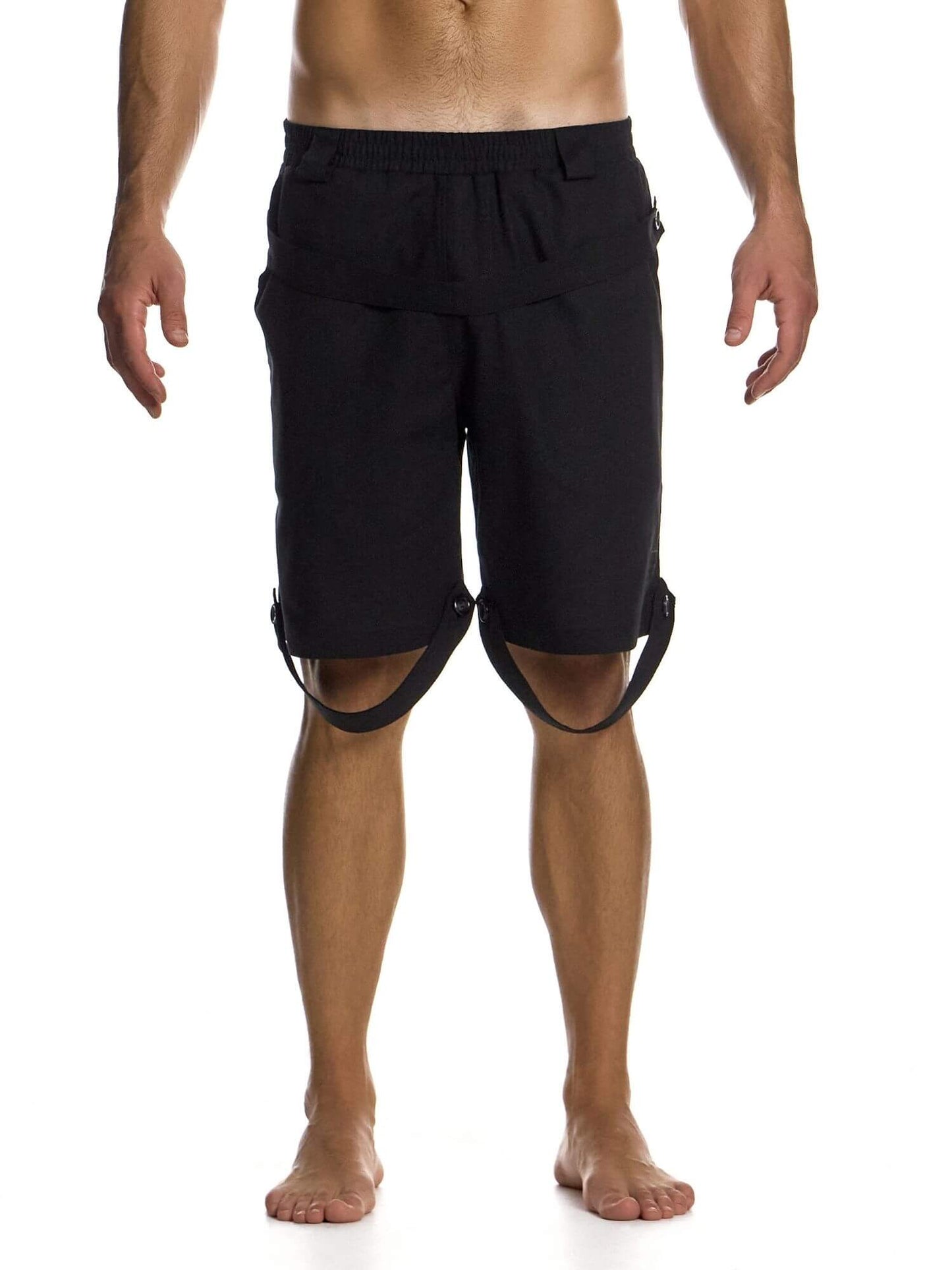 Black shorts with straps worn by a person on a white background