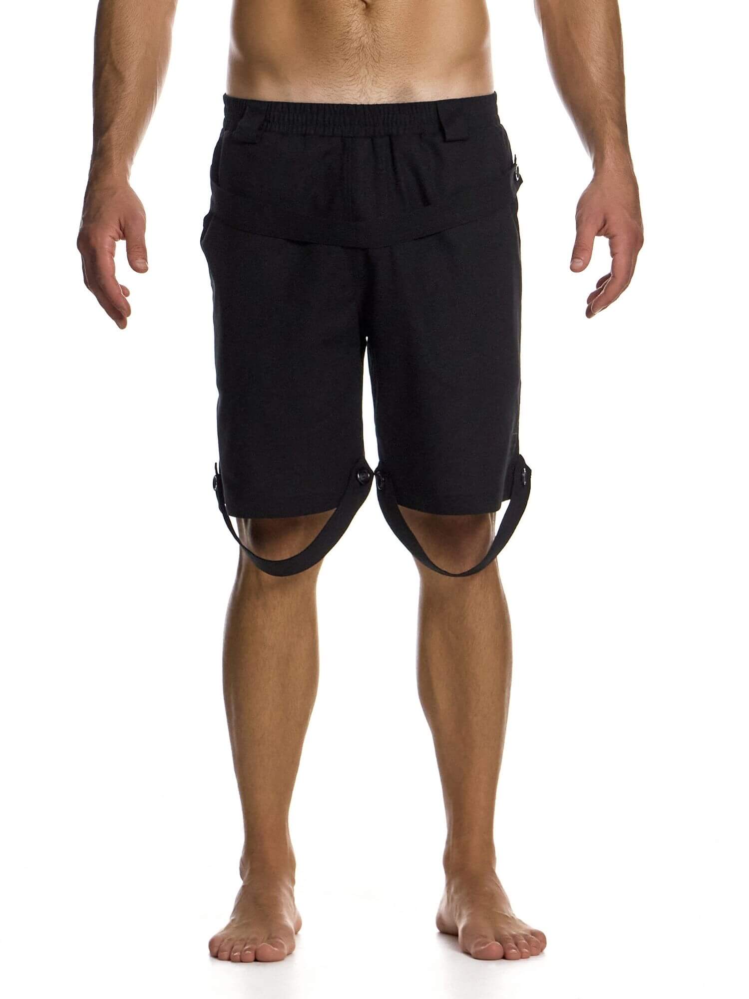 Black shorts with straps worn by a person on a white background