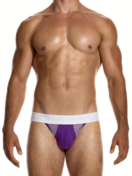 A muscular male model wearing a pair of purple and white mesh briefs with a white elastic waistband that reads 'ACOBUS VIVE'.