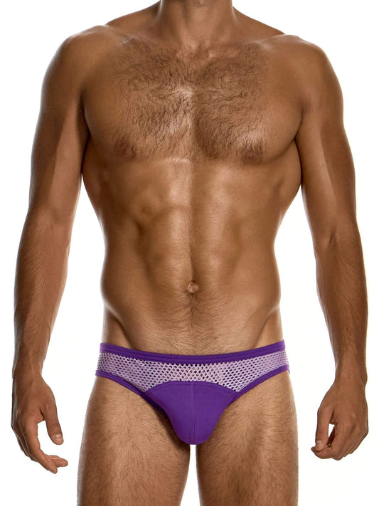 A man wearing a purple men's jockstrap with a purple mesh waistband, shown from the chest down against a white background.