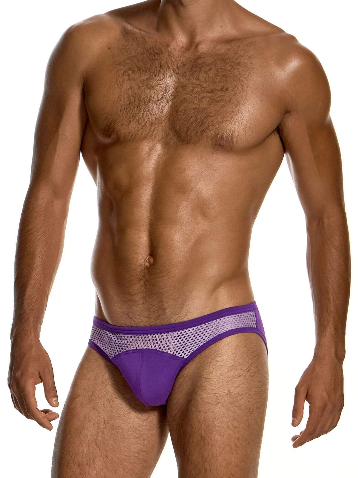 A close-up of a man's lower torso wearing a purple men's jockstrap with a mesh waistband, photographed against a plain white background.