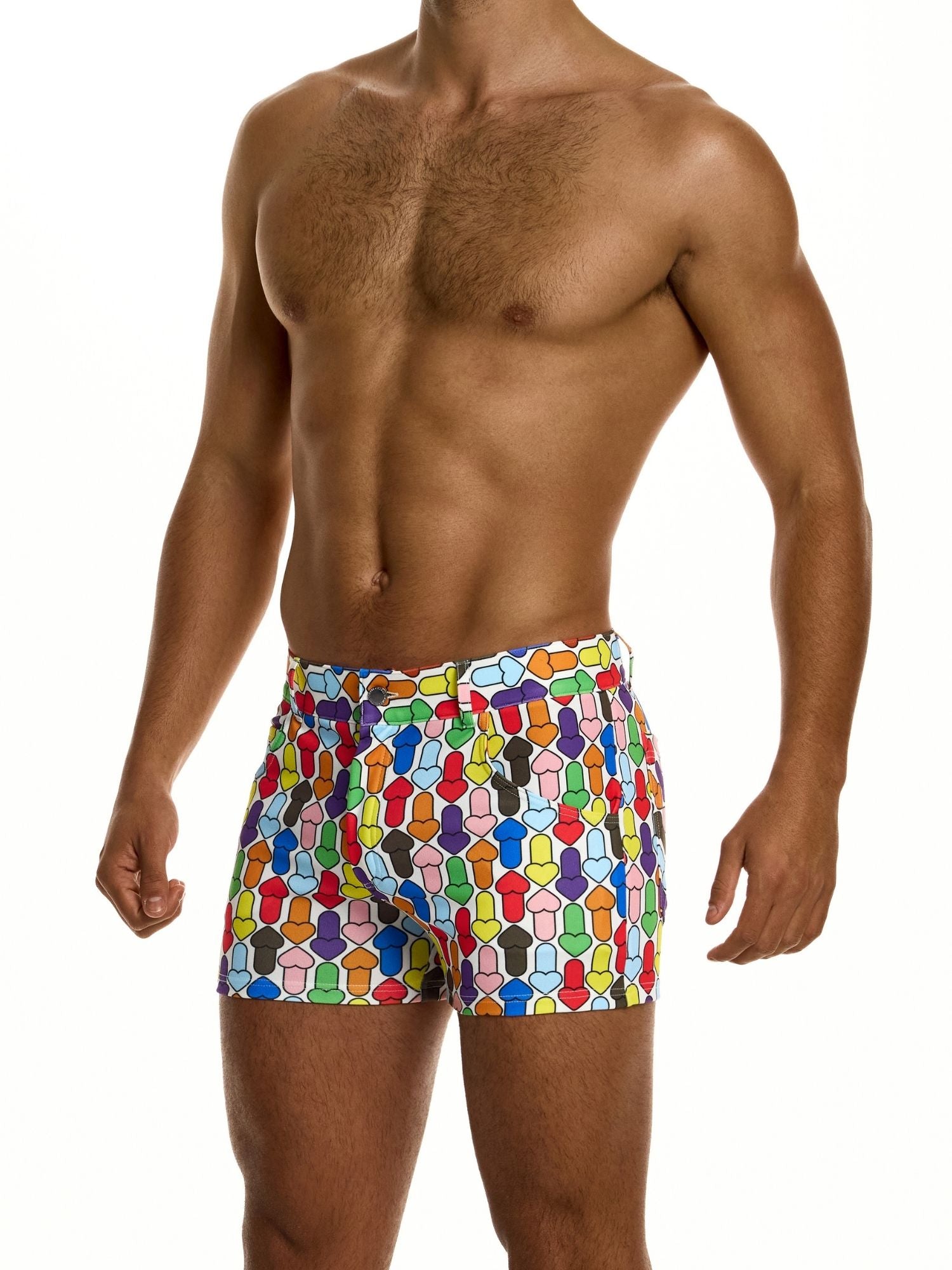 Man wearing colorful geometric patterned shorts on a white background