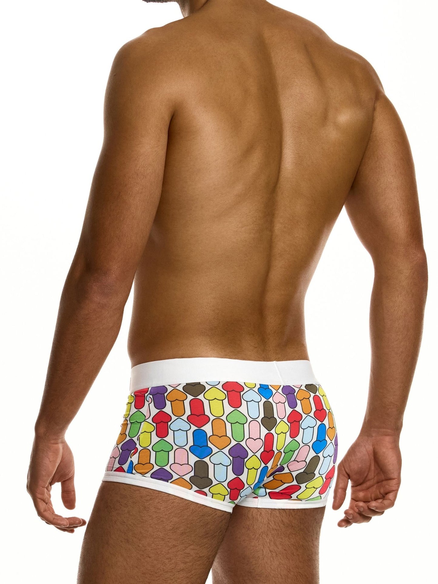 Man wearing colorful patterned underwear on a white background