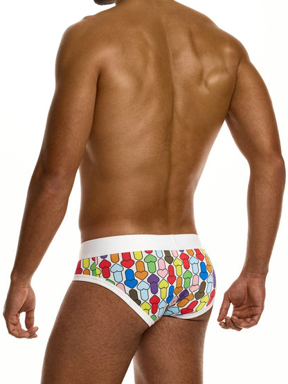 Man wearing colorful swim briefs on a white background