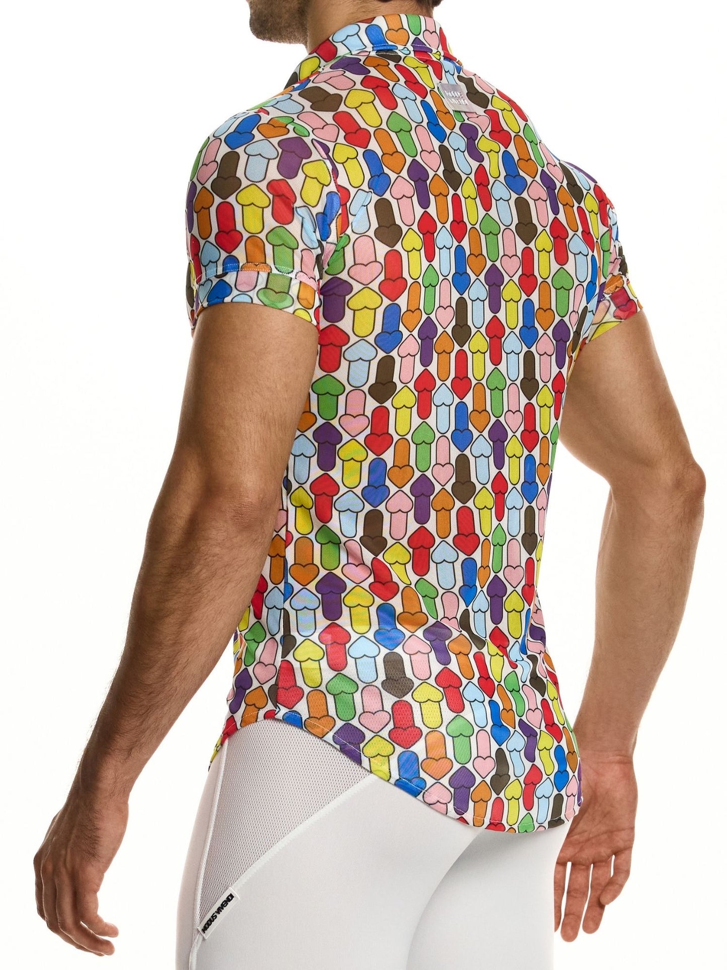 Colorful geometric patterned shirt worn by a person on a white background