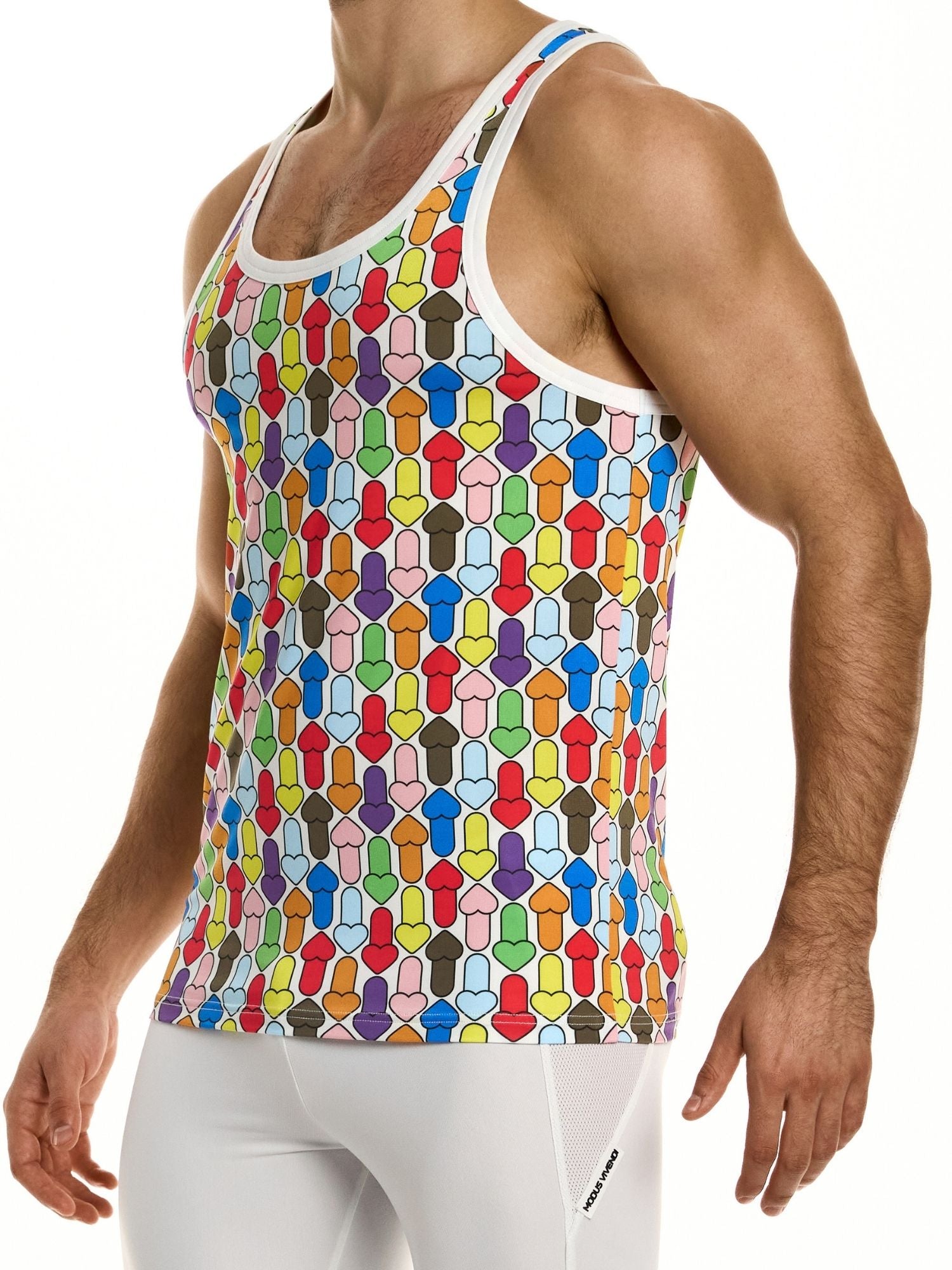 Colorful geometric patterned tank top worn by a person on a white background