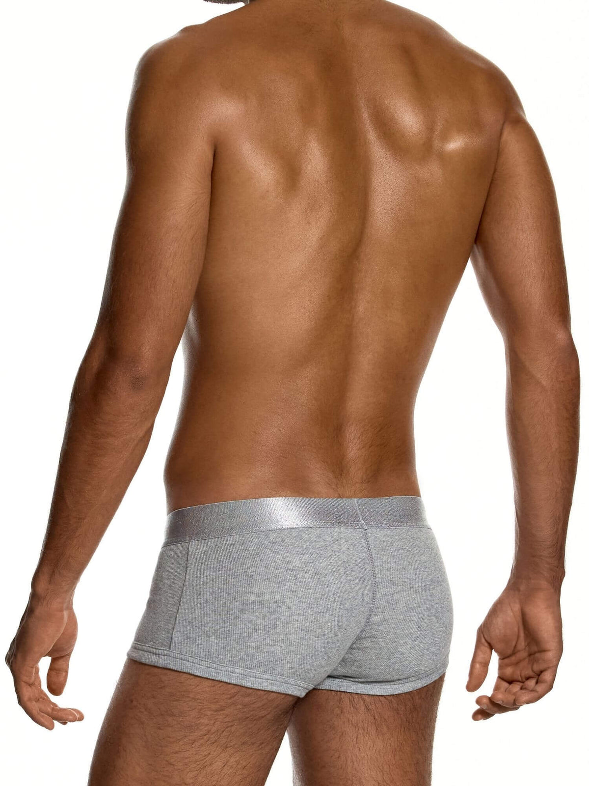 Rear view of a man wearing heather gray boxer briefs with a metallic silver waistband, set against a plain white background.