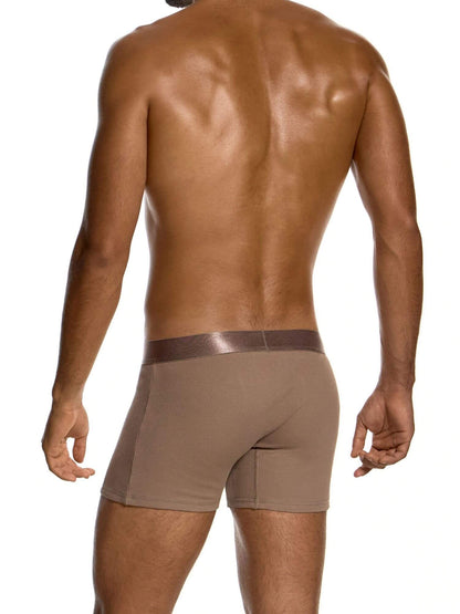 Rear view of a shirtless man wearing tan men's boxer briefs with a darker brown elastic waistband, set against a plain white background.
